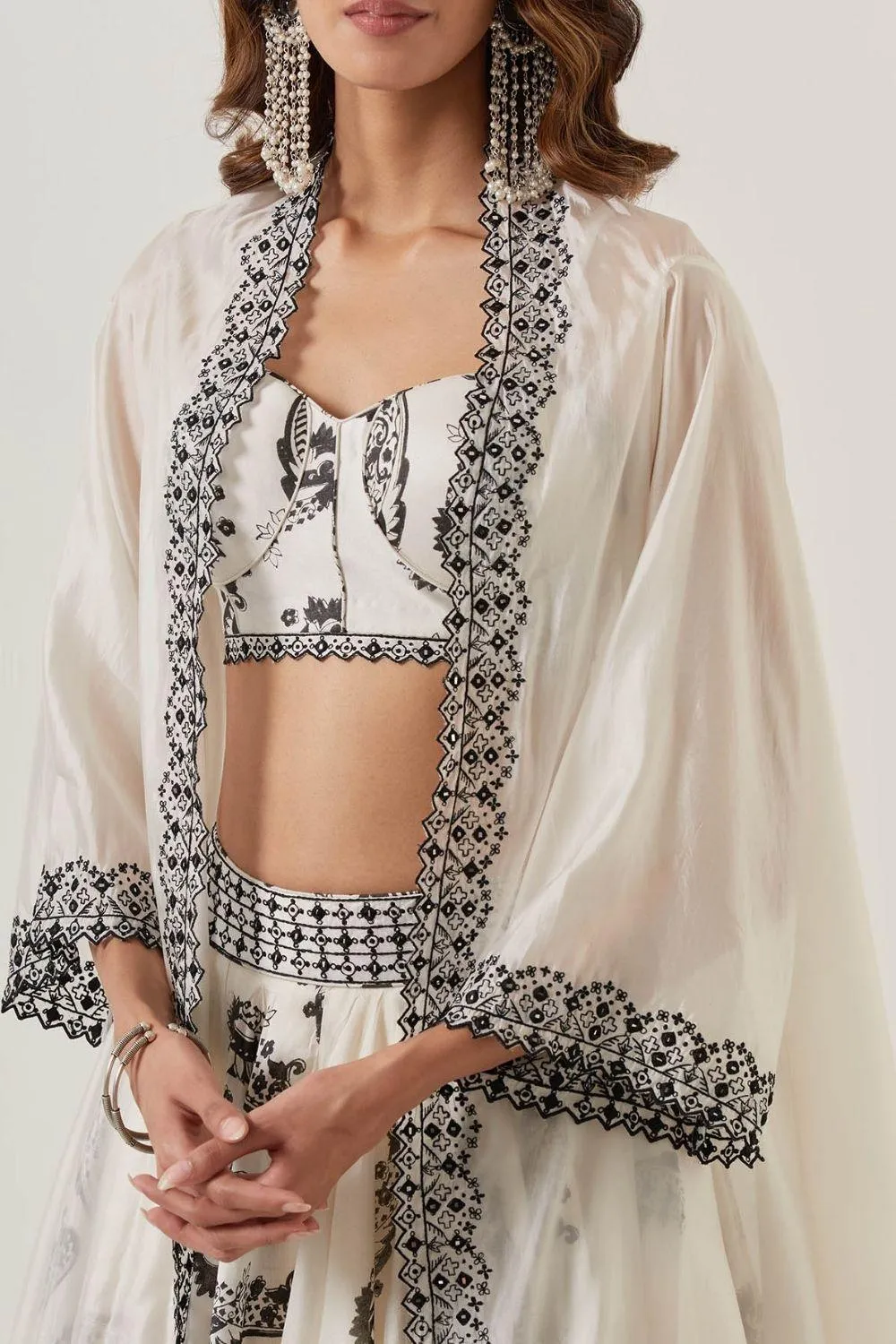 Ivory Printed Skirt Paired With Bralette & Cape